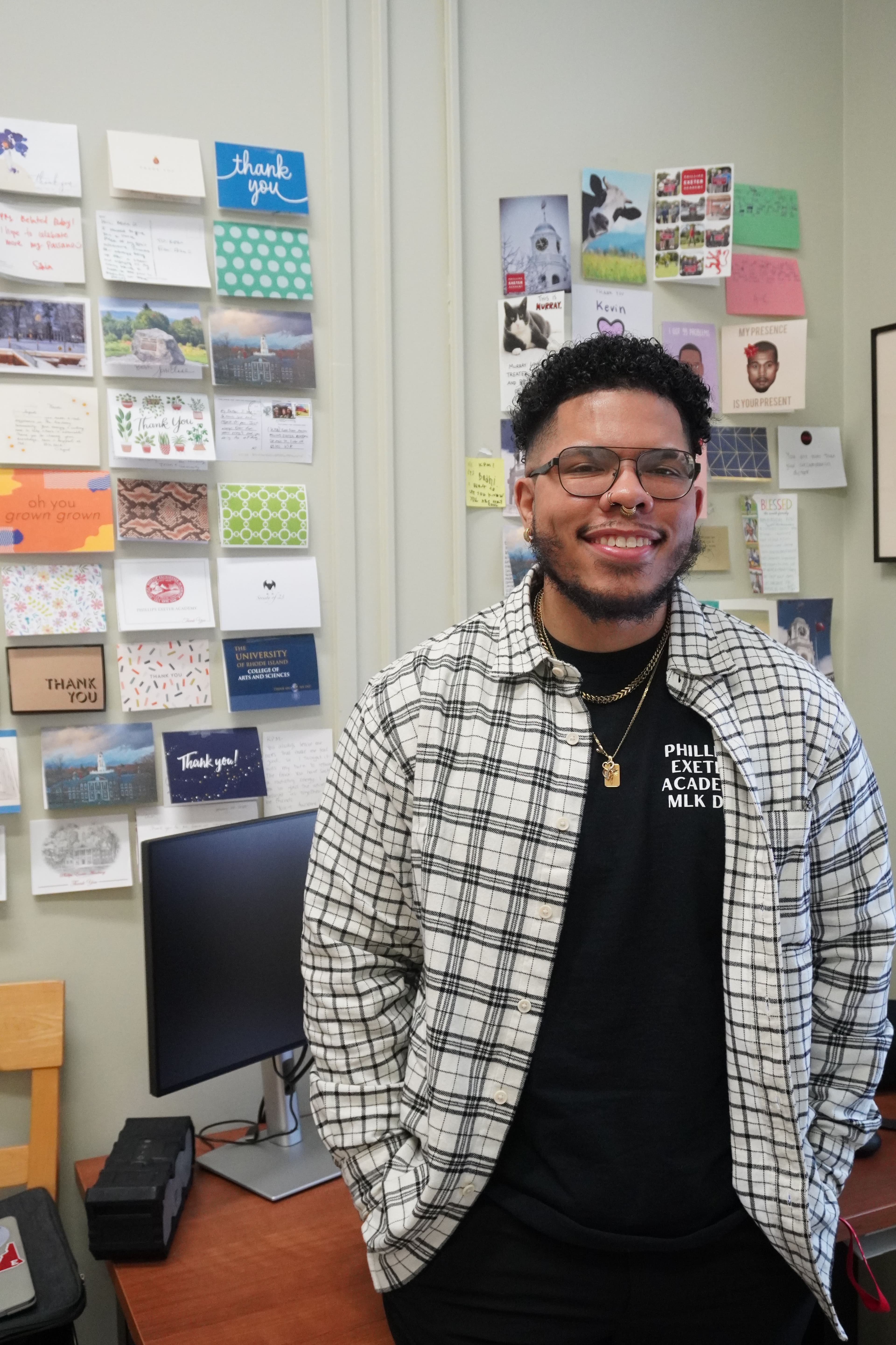 On a chilly, gray November day, students rush between classes, eyes cast down at their phones. Some are surprised to hear their name jovially called by Kevin Pajaro-Mariñez, fist-bumping each Exonian he comes across. Whether the Assistant Director of Equity and Inclusion is at his residence in Soule Hall, his workplace in the Office of Multicultural Affairs, or walking the paths of the Academy, he carries with him a certain warmth. To many students, Pajaro-Mariñez is not just a familiar face but a reassuring presence as a guiding and trustworthy mentor.