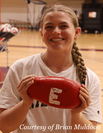 If you go to a girls’ varsity volleyball game, you will hear the unmistakable sound of shoes squeaking on the hardwood, the ball making contact with the players, and the cheers erupting from the stands. You will also hear the captain and recipient of this week’s Rock Award, Senior Liv Lang, offering on-court support and directions, helping guide the team toward victory. 